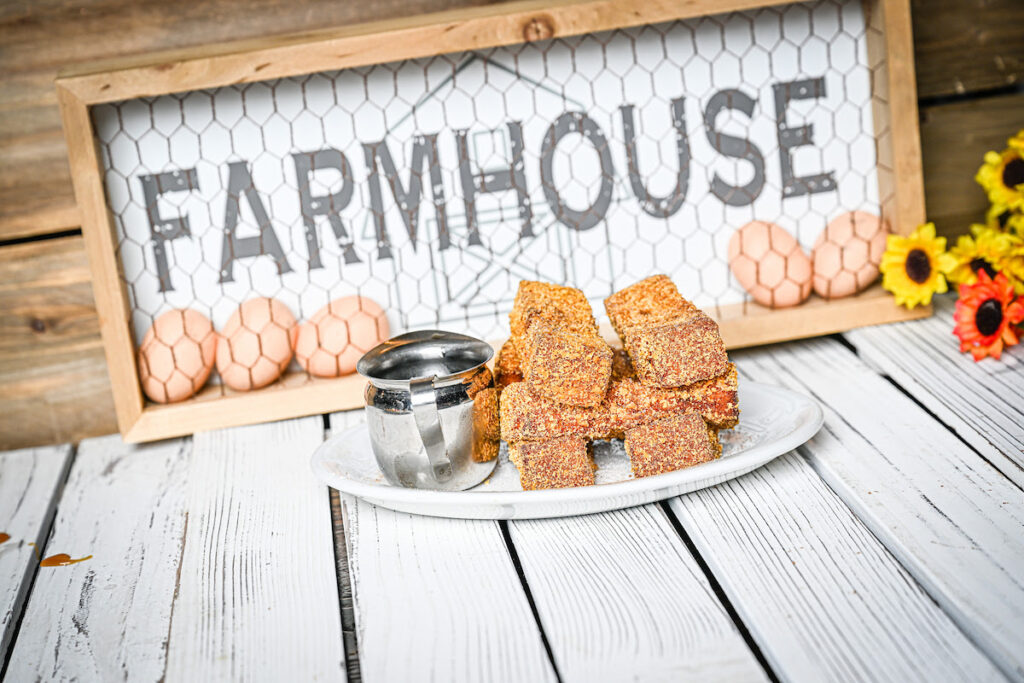 Pumpkin Caramel French Toast Sticks rolled in Cap’n Crunch and served with pumpkin caramel sauce at Hash House A Go Go Orlando's new fall menu.
