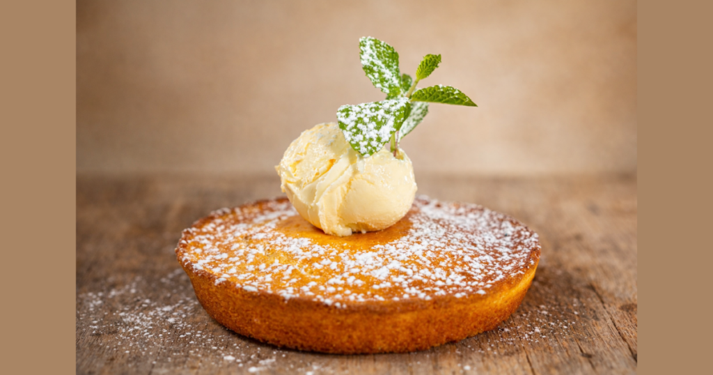 Limited Time at Hash House A Go Go Orlando: Seasonal Dishes You Need to Try Now 1 Blueberry cornbread with lemon butter at Hash House A Go Go Orlando seasonal spring menu item.